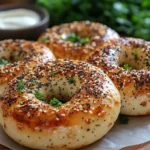 Golden everything bagels topped with sesame and poppy seeds, great for versatile snacking | kaynmaytkal.com
